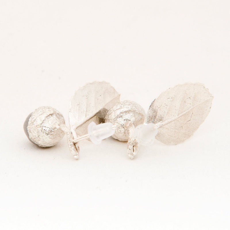 Small realistic sterling silver and glass acorn studs. Delicate leaf with a sterling silver and glass acorn. Grey colour glass